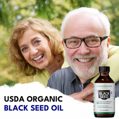 Couple with a bottle of Mother Nature Organics USDA Organic Black Seed Oil