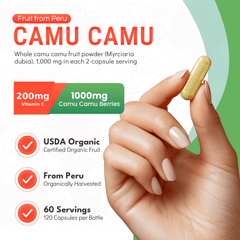 Hand holding a Mother Nature Organics Camu Camu capsule: USDA Organic, fruit from Peru, 60 servings