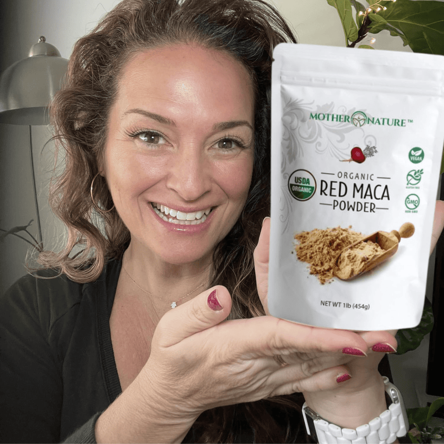 A woman holding a bag of Mother Nature Organics Organic Red Maca Powder