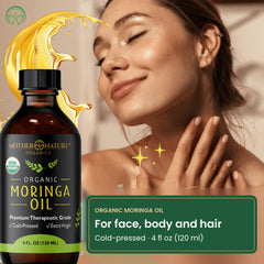 Woman with a bottle of moringa oil for face, body and hair