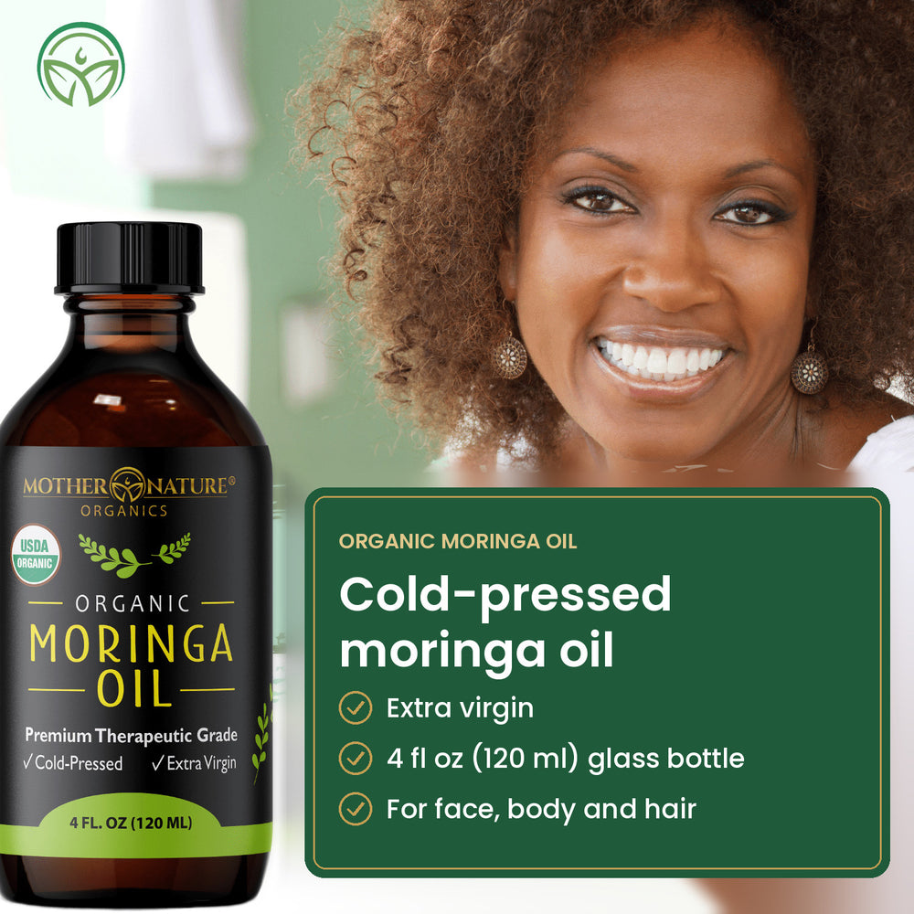 Smiling woman beside a 4 fl oz bottle of cold-pressed moringa oil